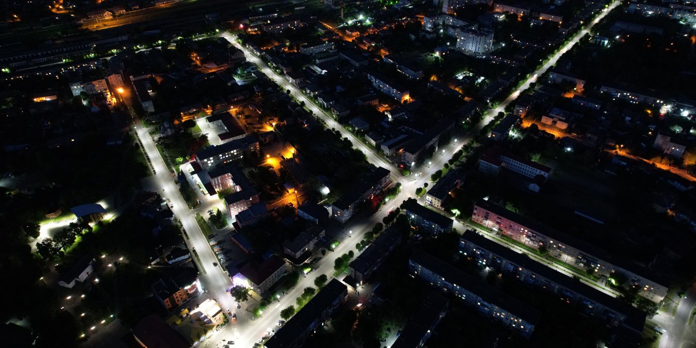An aerial view of a city at night.