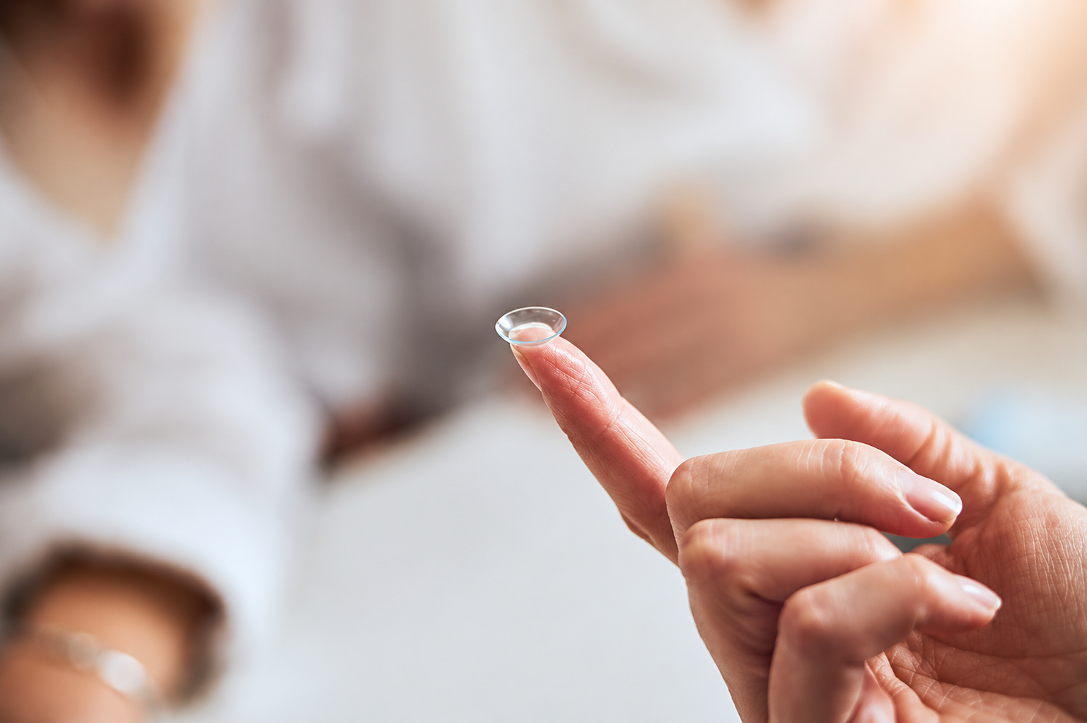 Lens on a fingertip