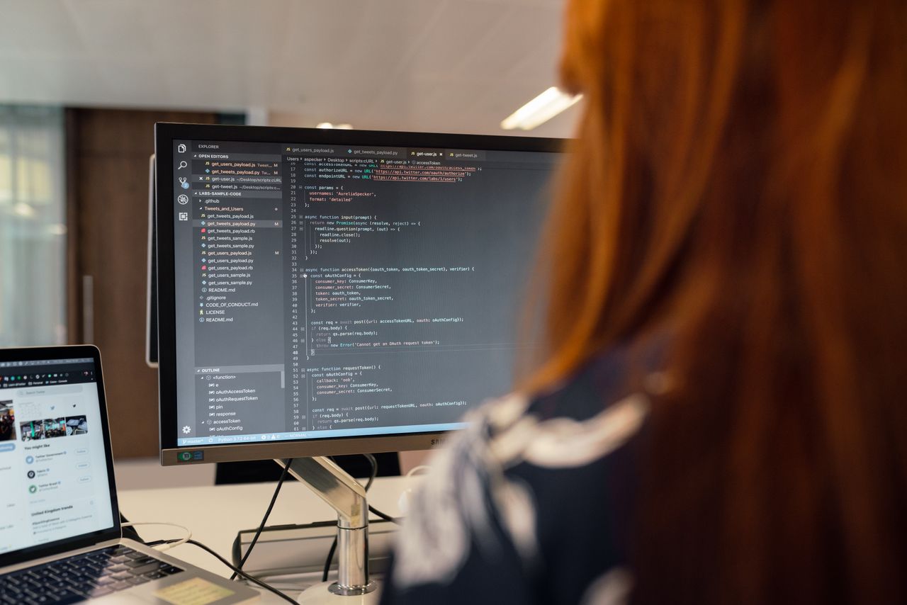 A software developer working at a computer.