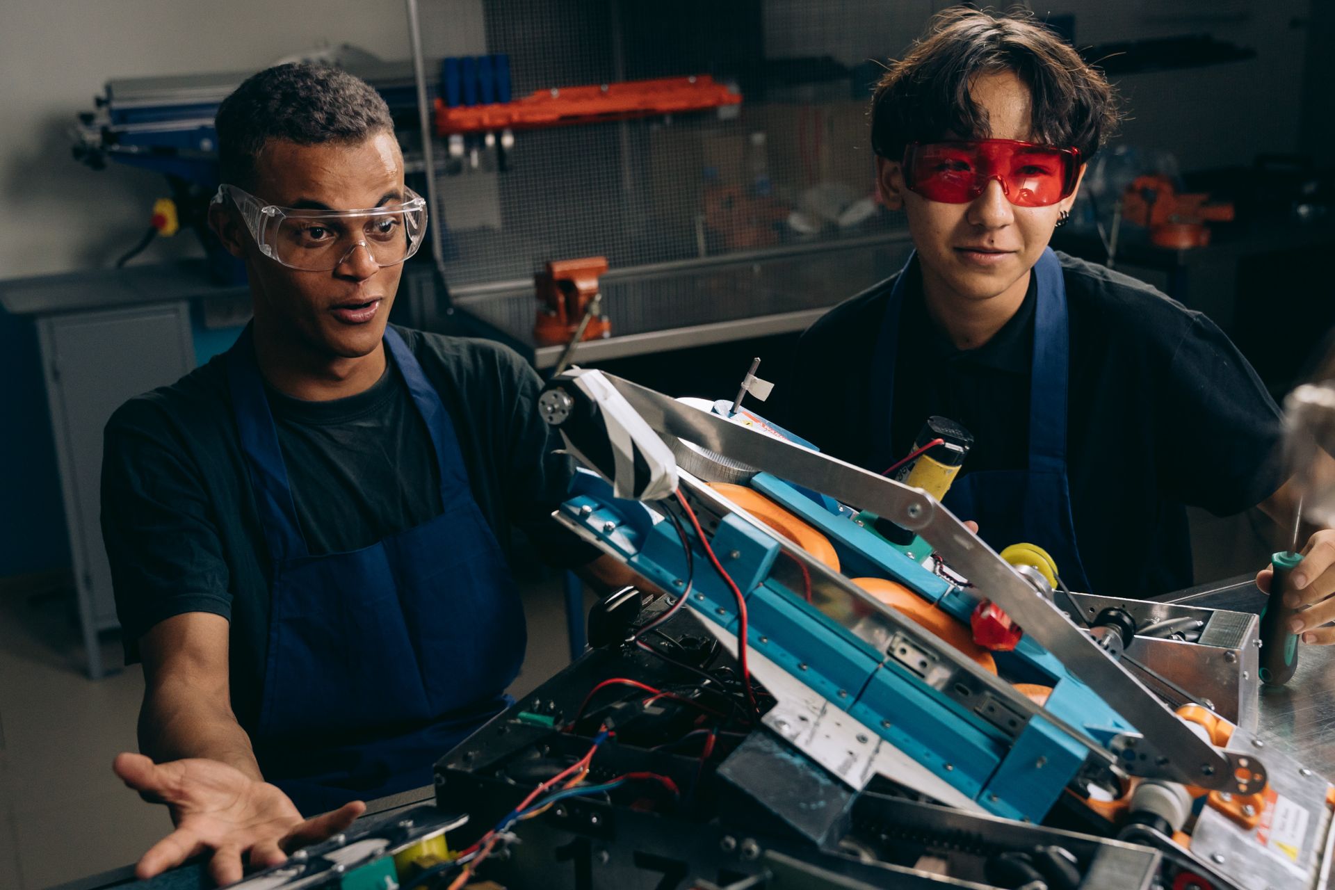 An engineer inspecting equipment in a workshop.