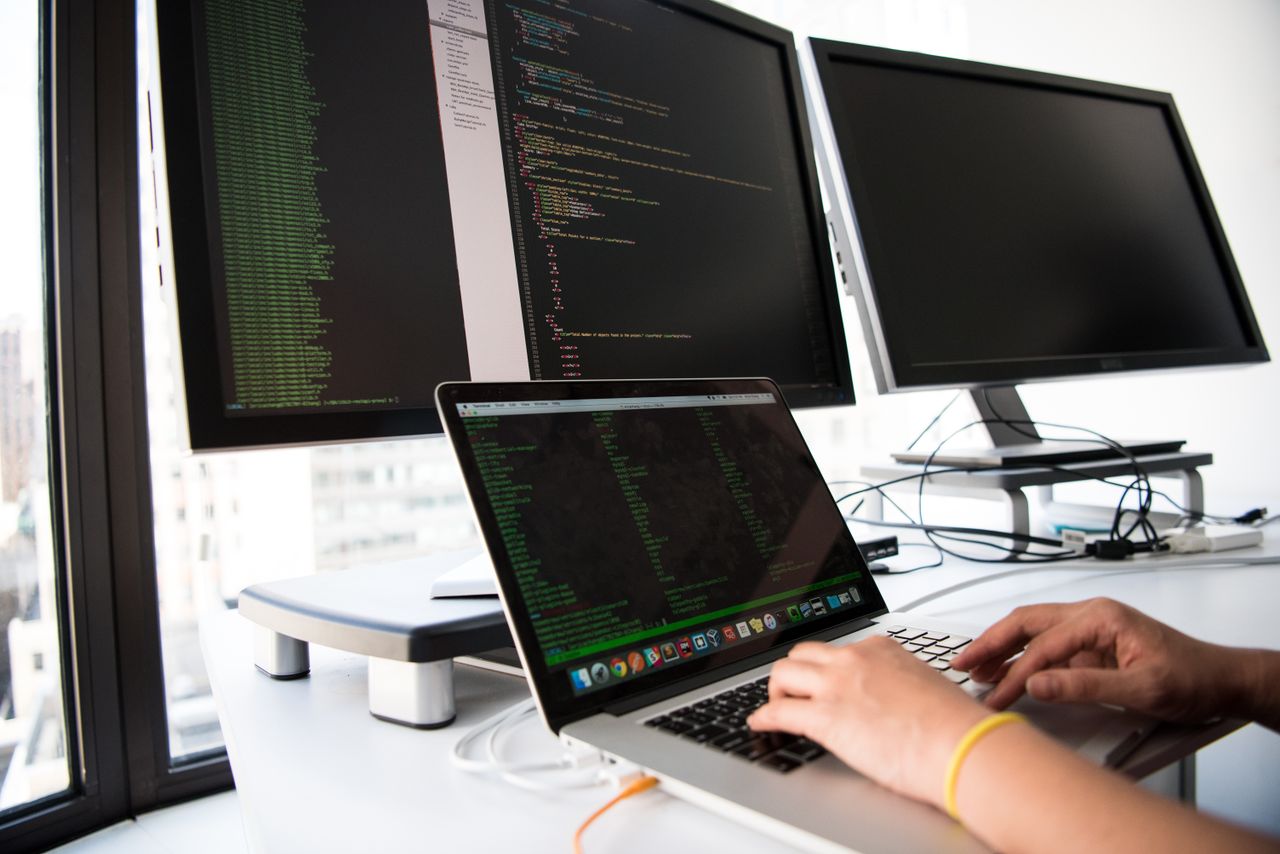 A software developer working at a computer.